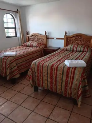 Cama o camas de una habitación en Villas Tonantzintla