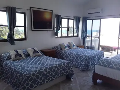 Cama o camas de una habitación en COCO HOUSE CHACHALACAS