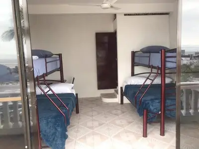 Cama o camas de una habitación en COCO HOUSE CHACHALACAS