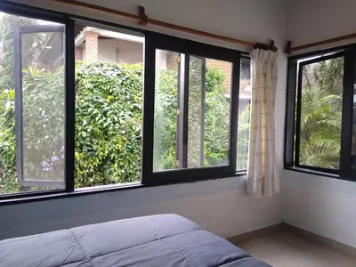 Cama o camas de una habitación en Hospedaje Anayauhcalli