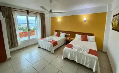 Cama o camas de una habitación en Hotel Serymar