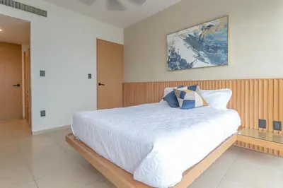Cama o camas de una habitación en Amazing Condo Ocean View By Bamboo Skylife