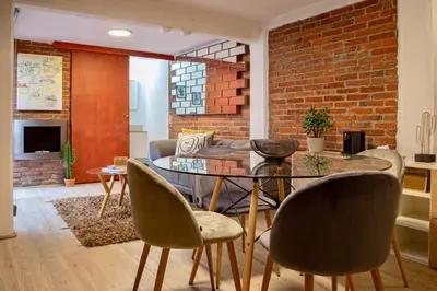 Una televisión o centro de entretenimiento en Mi Zona Lodging Coyoacán