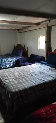 Cama o camas de una habitación en Casa del bosque