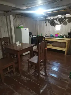 Una cocina o zona de cocina en Casa del bosque