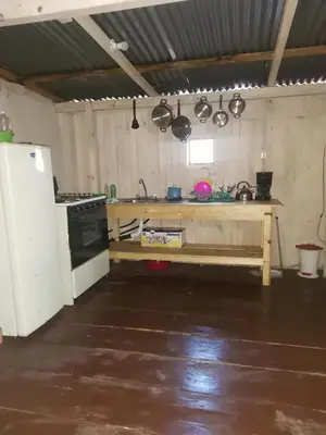 Una cocina o zona de cocina en Casa del bosque