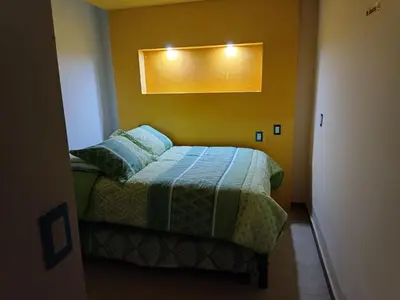 Cama o camas de una habitación en PentHouse con Roof Garden Privado Aeropuerto CDMX