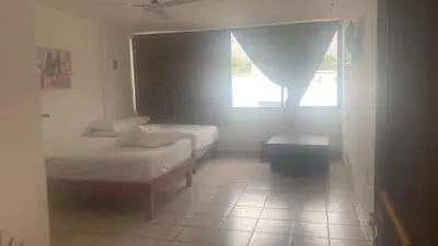 Cama o camas de una habitación en HOSTEL CAFE EL PESCADOR