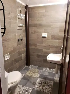 Un baño de OM Studio