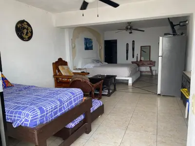 Cama o camas de una habitación en Gran habitacion con terraza vista espectacular, piscina