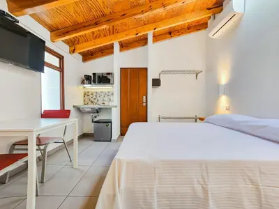 Una cocina o zona de cocina en Niebla Suites