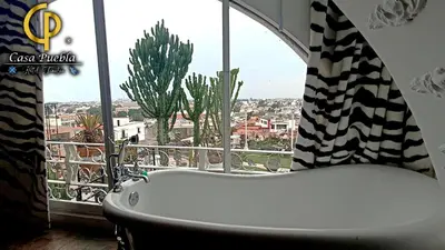 Un balcón o terraza de Hotel Temático Casa Puebla