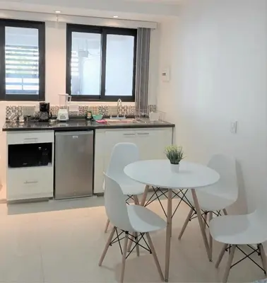 Una cocina o zona de cocina en Habitaciones Amubladas Logos II