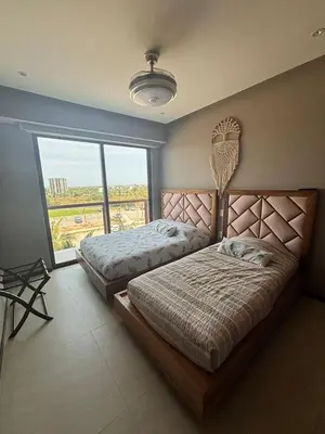 Cama o camas de una habitación en Casa Ohana Acapulco Diamante