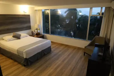 Cama o camas de una habitación en Hotel Grand Vista Cuernavaca