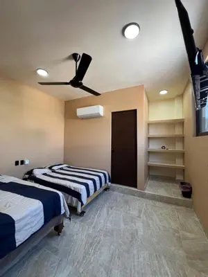 Cama o camas de una habitación en Hotel las flores