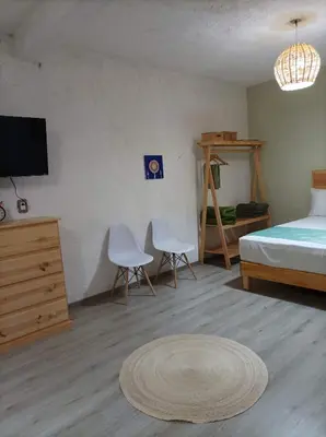 Cama o camas de una habitación en Alojamiento el nixtamal