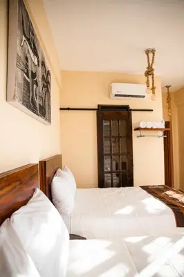 Cama o camas de una habitación en Hotel Santa Cruz Punta Zicatela