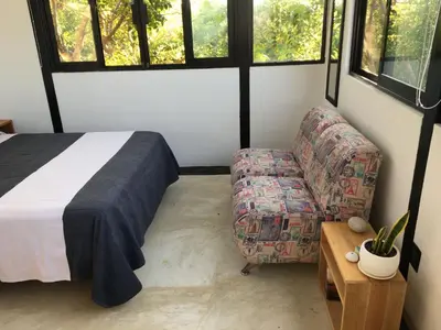 Cama o camas de una habitación en Double Bungalow With Partial Sea View, Full Kitchen