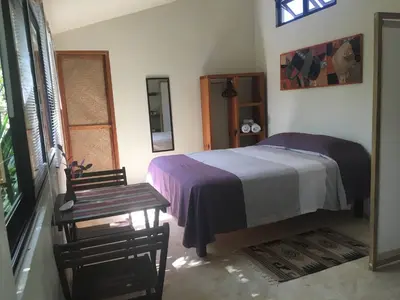 Cama o camas de una habitación en Double Bed, Queen size, small kitchen, terrace, wi fi air condition quiet