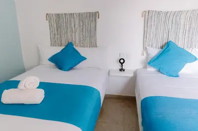 Cama o camas de una habitación en blue BOCANA
