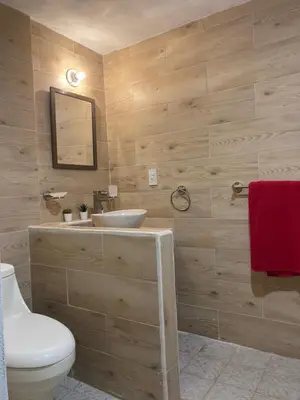 Un baño de LU'UM Master Suites