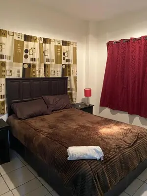 Cama o camas de una habitación en Departamento con Terraza LOBO