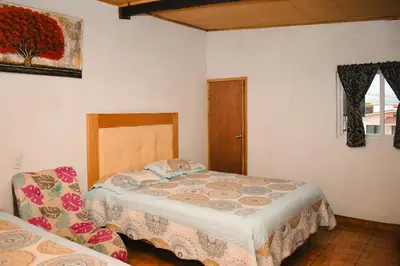 Cama o camas de una habitación en CABAÑA tipo habitación planta alta en Zacatlàn