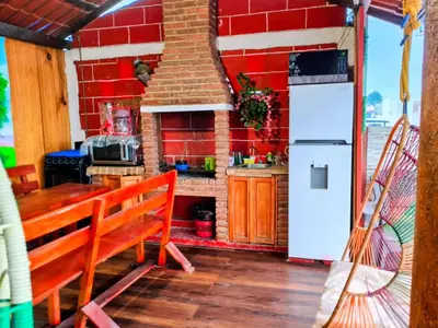 Una cocina o zona de cocina en CABAÑA tipo habitación planta alta en Zacatlàn