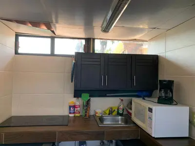 Una cocina o zona de cocina en Suite La Lomita #1 Climatizada Zona Dorada Tuxtla