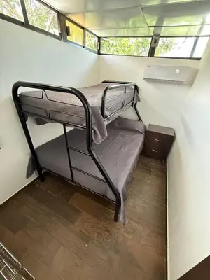 Cama o camas de una habitación en Suite La Lomita #1 Climatizada Zona Dorada Tuxtla