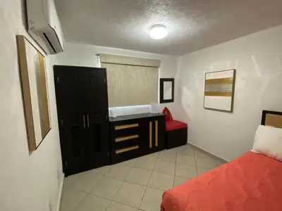 Cama o camas de una habitación en Acapulco Diamante hermoso departamento