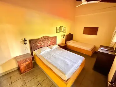 Cama o camas de una habitación en Hotel Rancho Escondito