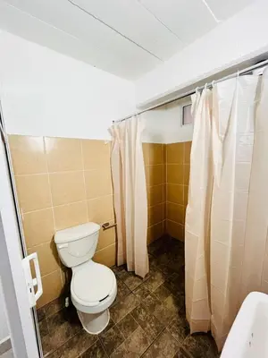 Un baño de Habitaciones LEONOR