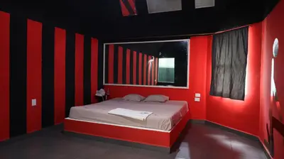 Cama o camas de una habitación en La Selva Auto Hotel ADULTS ONLY