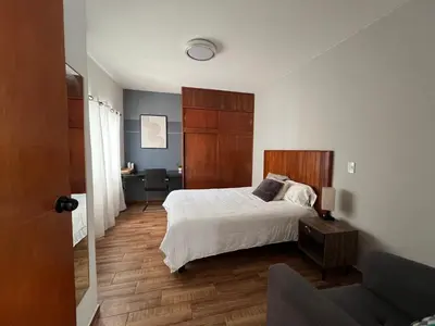 Cama o camas de una habitación en Departamento Nubes