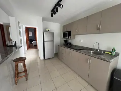 Una cocina o zona de cocina en Departamento Nubes