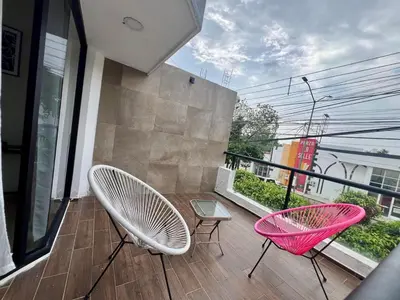 Un balcón o terraza de Departamento Nubes