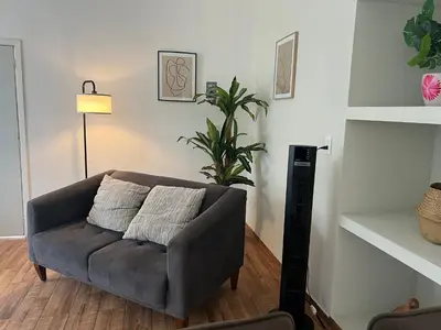 Zona de estar de Departamento Nubes