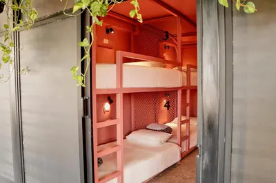 Cama o camas de una habitación en Casa Nomada Tuxtla Hotel - Hostal