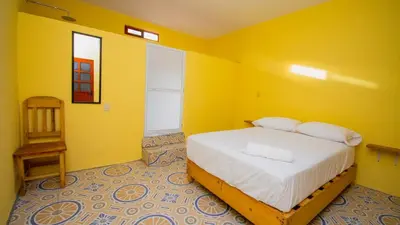 Cama o camas de una habitación en Hotel La Playa