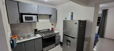 Una cocina o zona de cocina en Departamento Aeropuerto Puebla