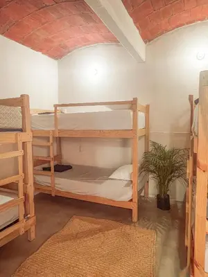 Cama o camas de una habitación en Hostel Casa Maguey