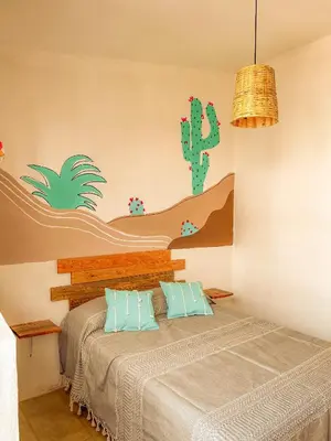 Cama o camas de una habitación en Hostel Casa Maguey