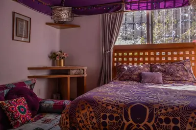 Cama o camas de una habitación en Casa en centro de Coyoacán