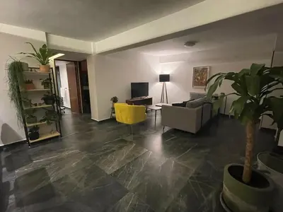 Una televisión o centro de entretenimiento en Great apartment in the heart of Coyoacan