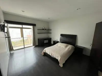 Cama o camas de una habitación en Habitación Ojo de Agua