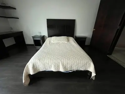 Cama o camas de una habitación en Habitación Ojo de Agua