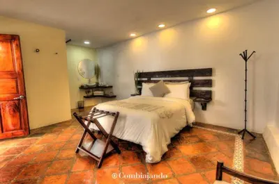 Cama o camas de una habitación en Hotel La Cofradía