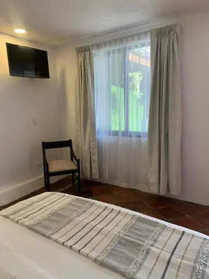 Cama o camas de una habitación en Hotel La Cofradía